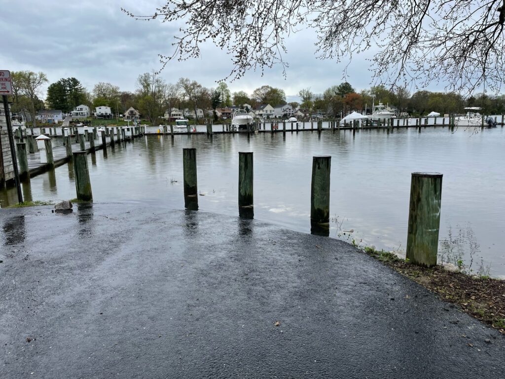 a body of water with a dock and boats in it (MyCoast AI)