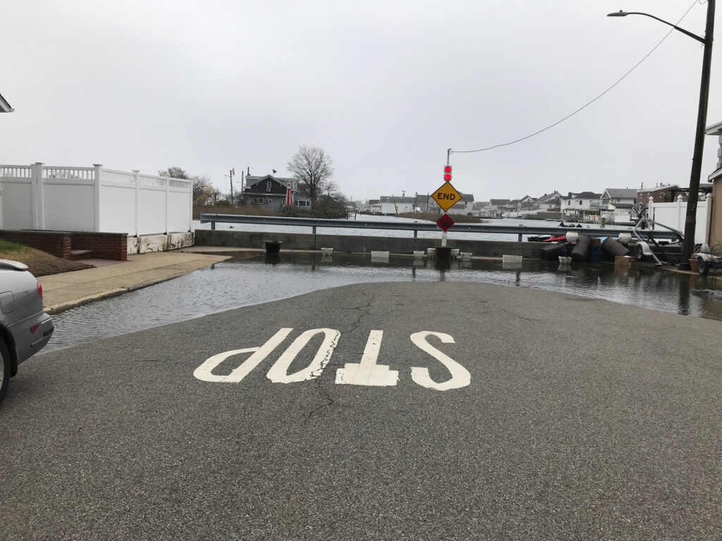 a road with a sign on it (MyCoast AI)