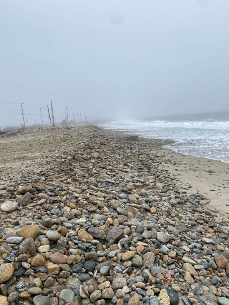 a rocky beach with power lines (MyCoast AI)