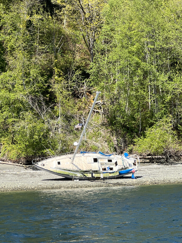 a boat is tied to a dock (MyCoast AI)