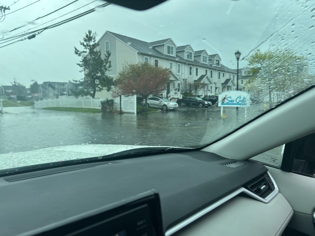 a view of a flooded street from a car (MyCoast AI)