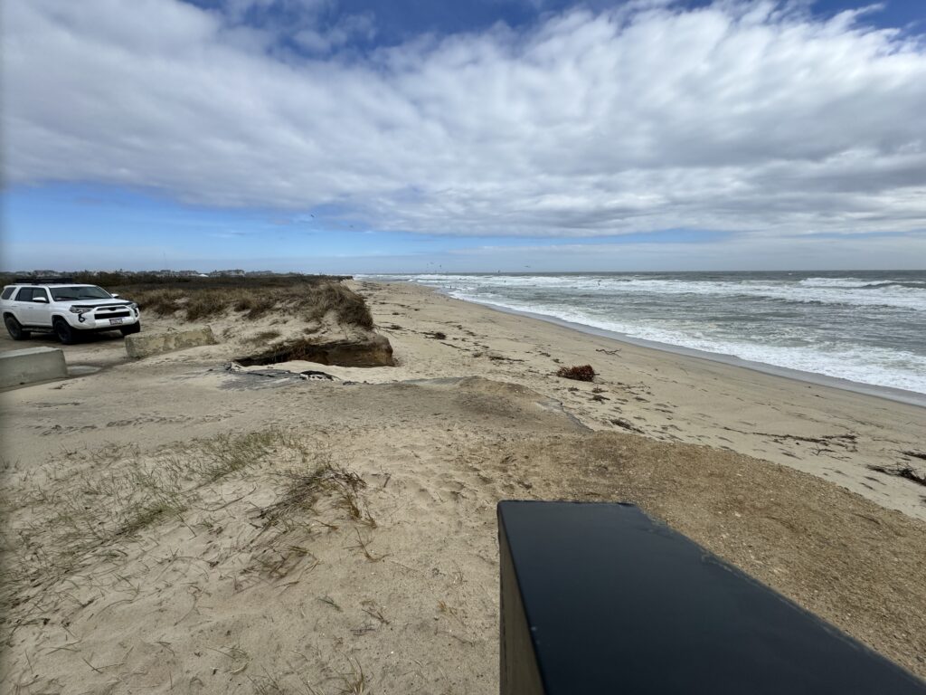 a car parked on a beach (MyCoast AI)