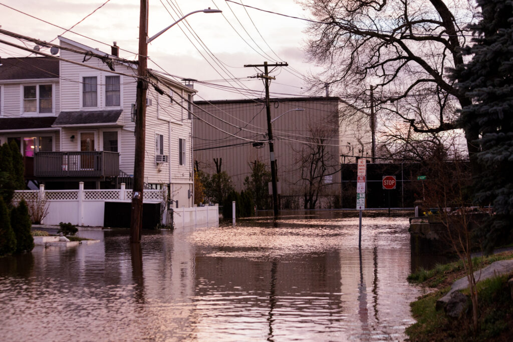 a flooded street with houses (MyCoast AI)