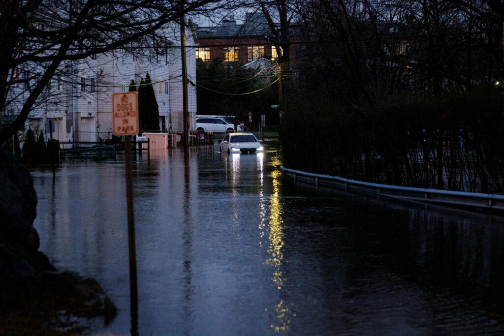 a flooded street with cars (MyCoast AI)