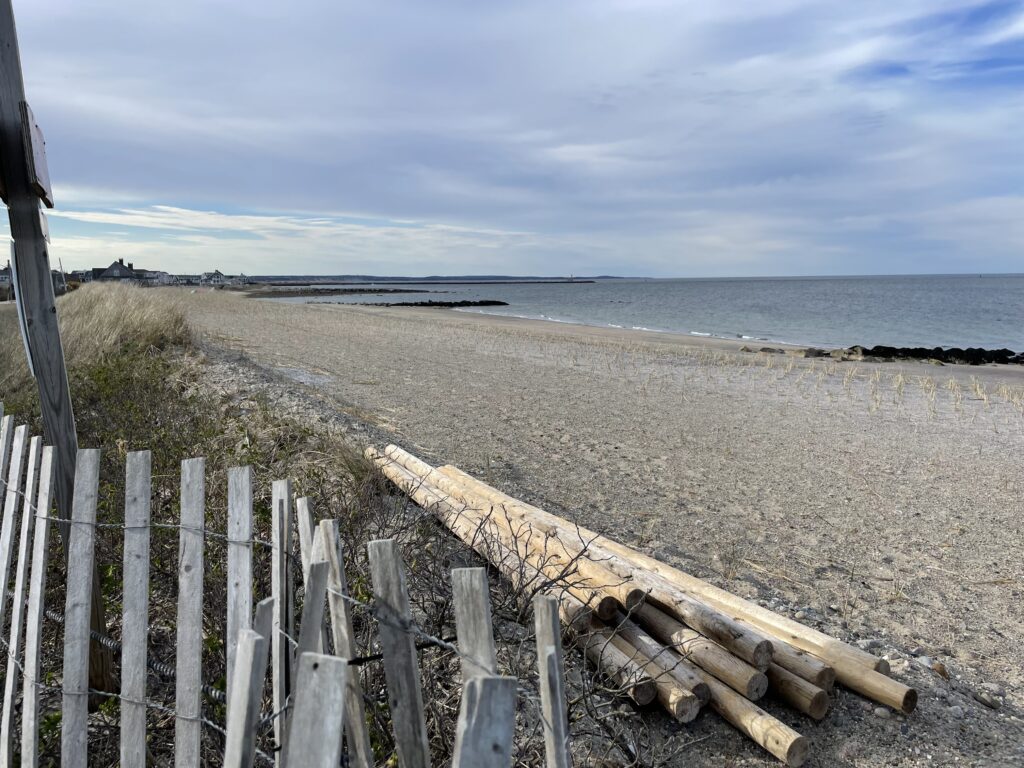 a wooden fence on a beach (MyCoast AI)