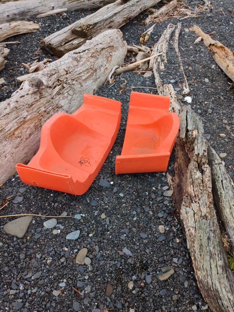 a group of orange objects on the ground (MyCoast AI)