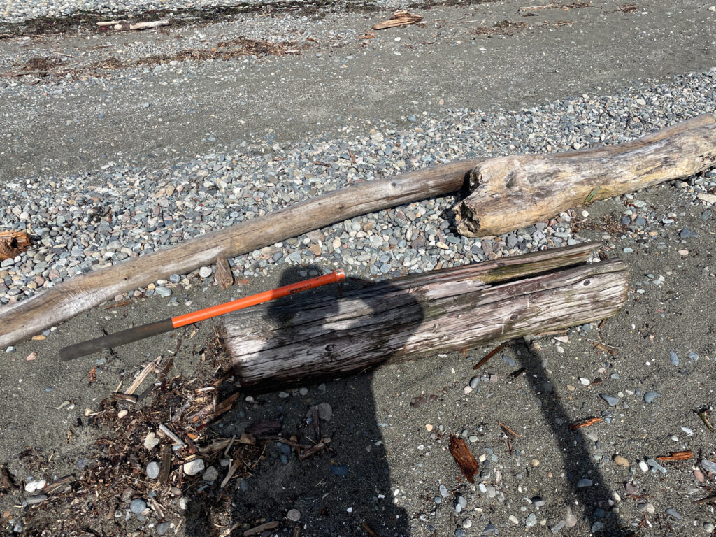 a wooden bench sits on the ground (MyCoast AI)