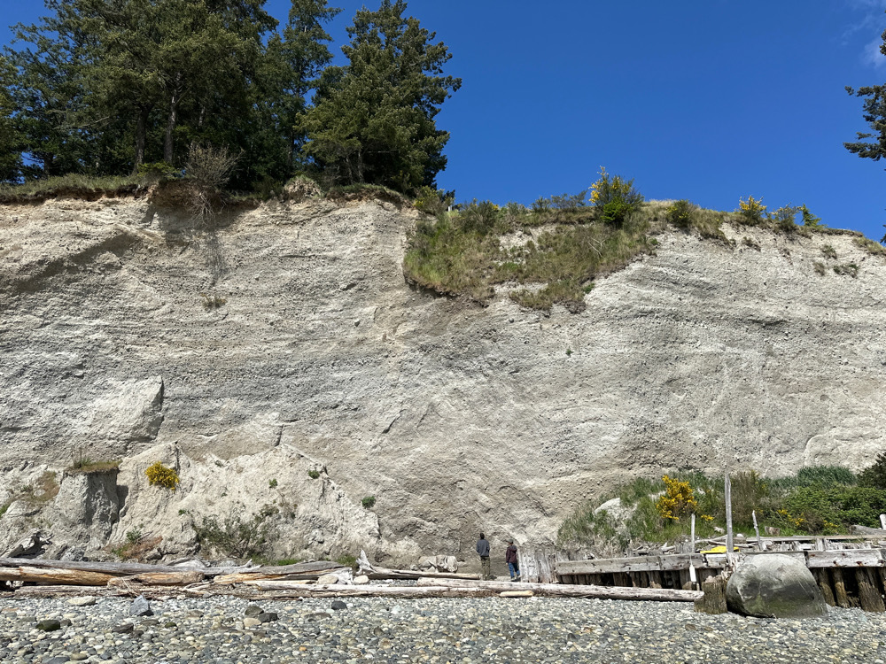 a rocky hill with people walking on it (MyCoast AI)
