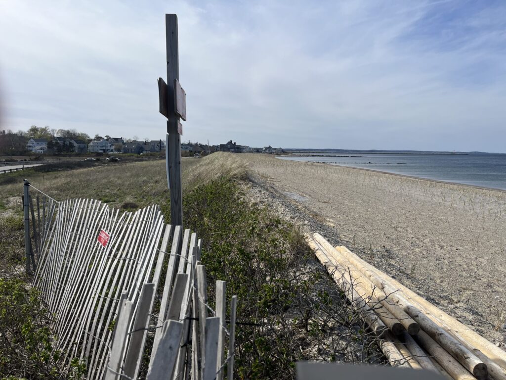 a wooden fence along a beach (MyCoast AI)