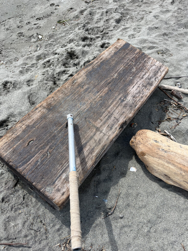 a wooden bench on the ground (MyCoast AI)