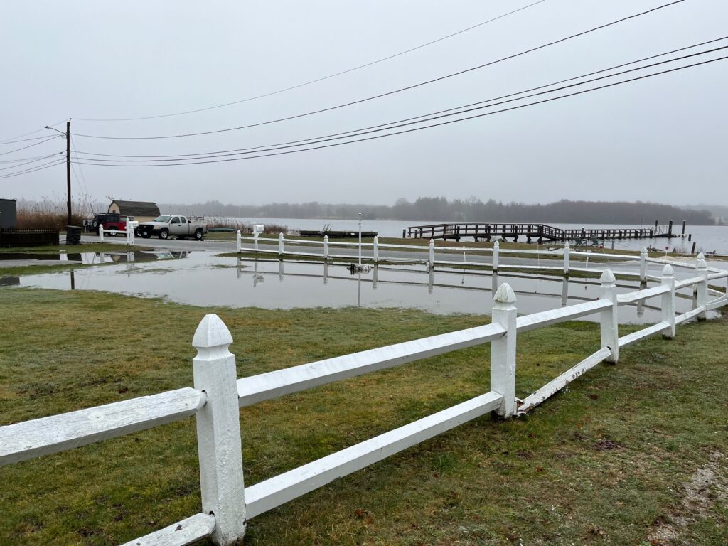 a white fence with a white railing (MyCoast AI)