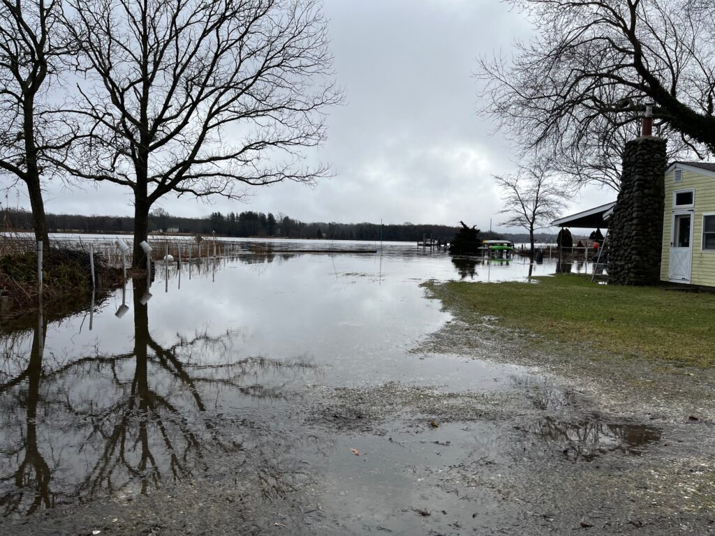 a flooded area with houses and trees (MyCoast AI)