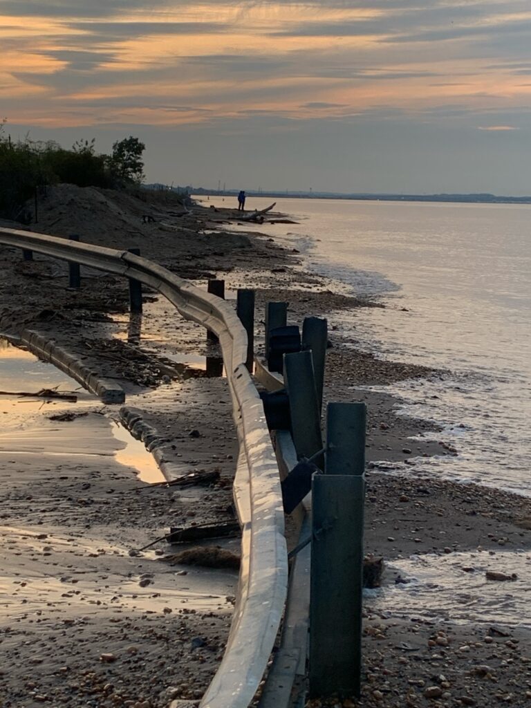 a wooden bench on a beach (MyCoast AI)