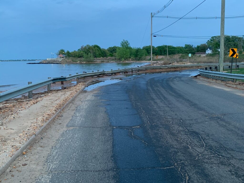 a road next to a body of water (MyCoast AI)