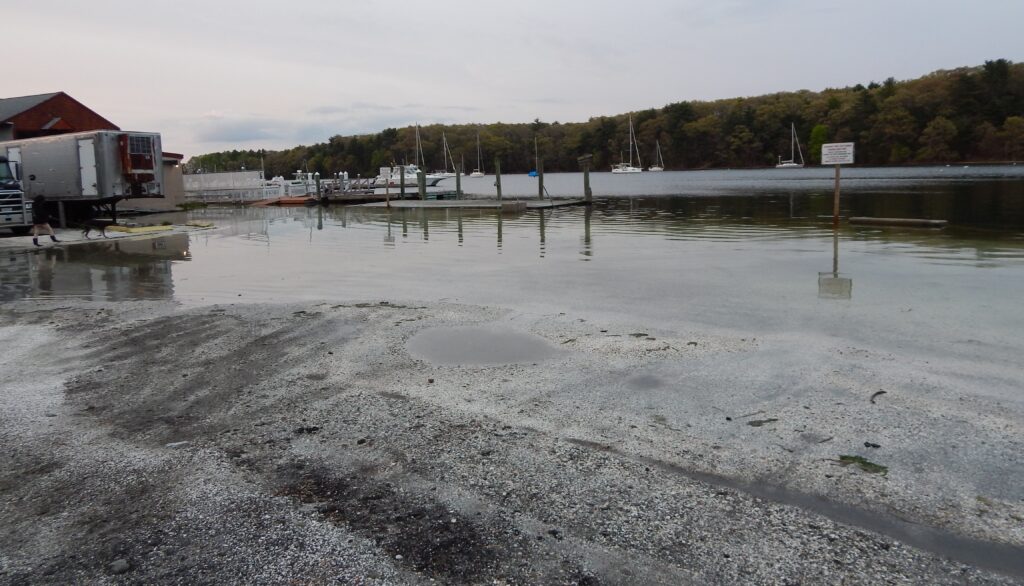 a body of water with a dock and boats in it (MyCoast AI)