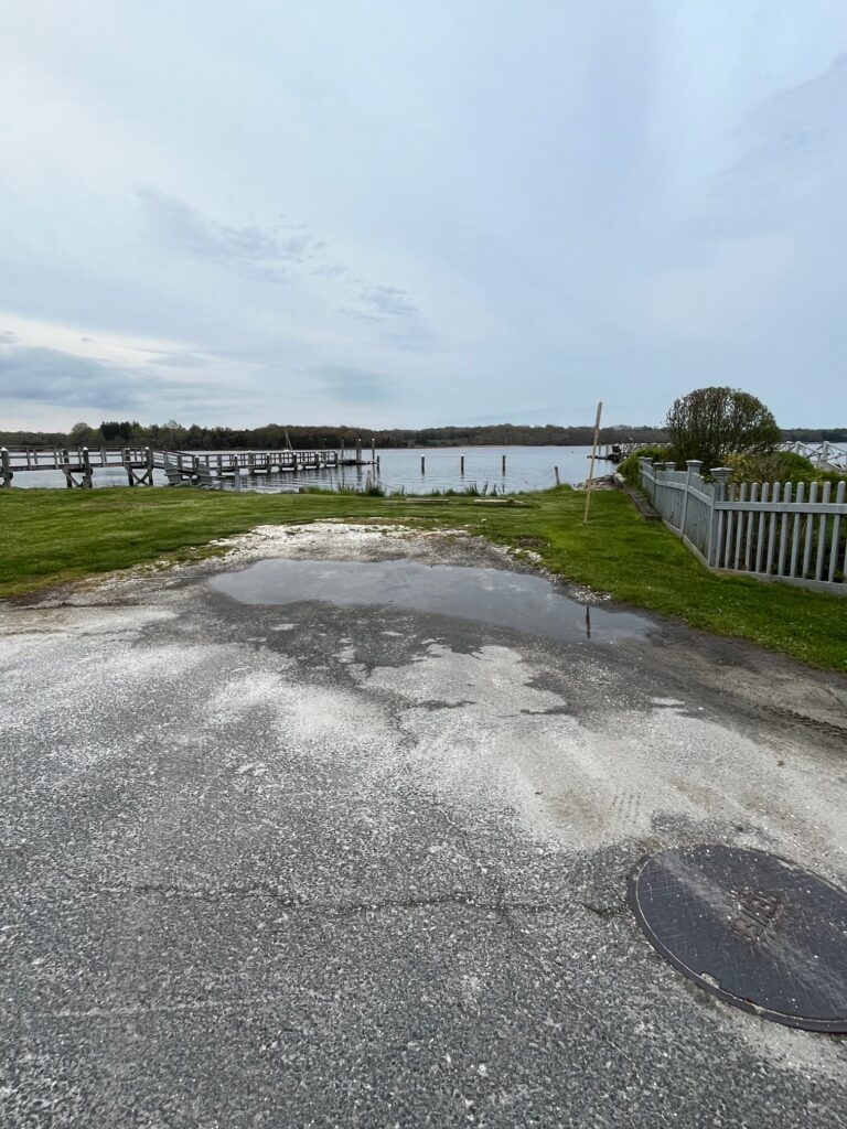a road with water on the side (MyCoast AI)