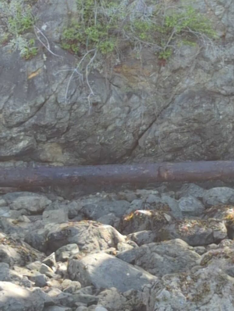 a rocky area with a pipe (MyCoast AI)