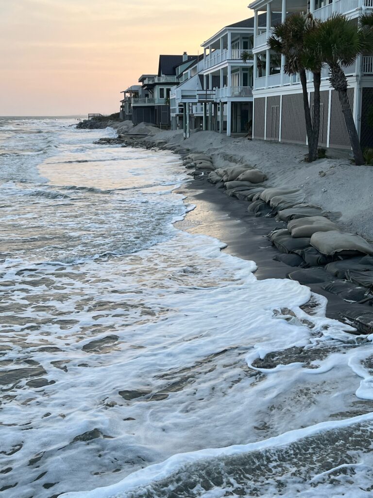 a beach with a row of houses (MyCoast AI)