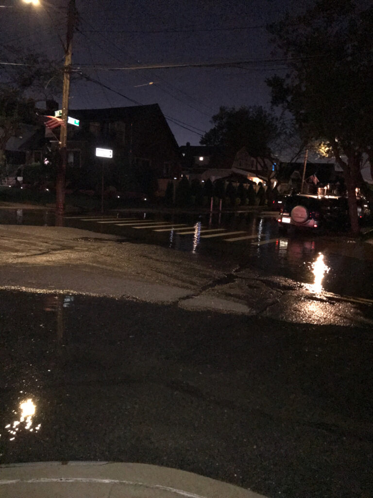 a wet street at night (MyCoast AI)