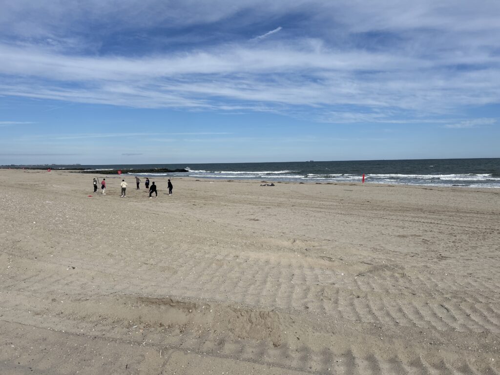 a group of people walking on a beach (MyCoast AI)