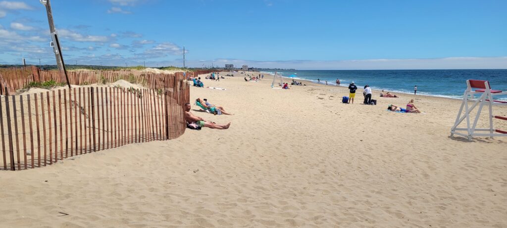 people lying on a beach (MyCoast AI)