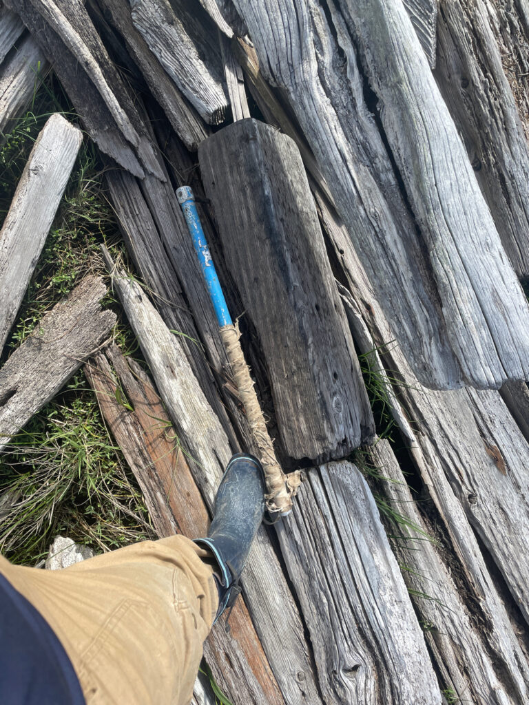 a knife on a wood deck (MyCoast AI)