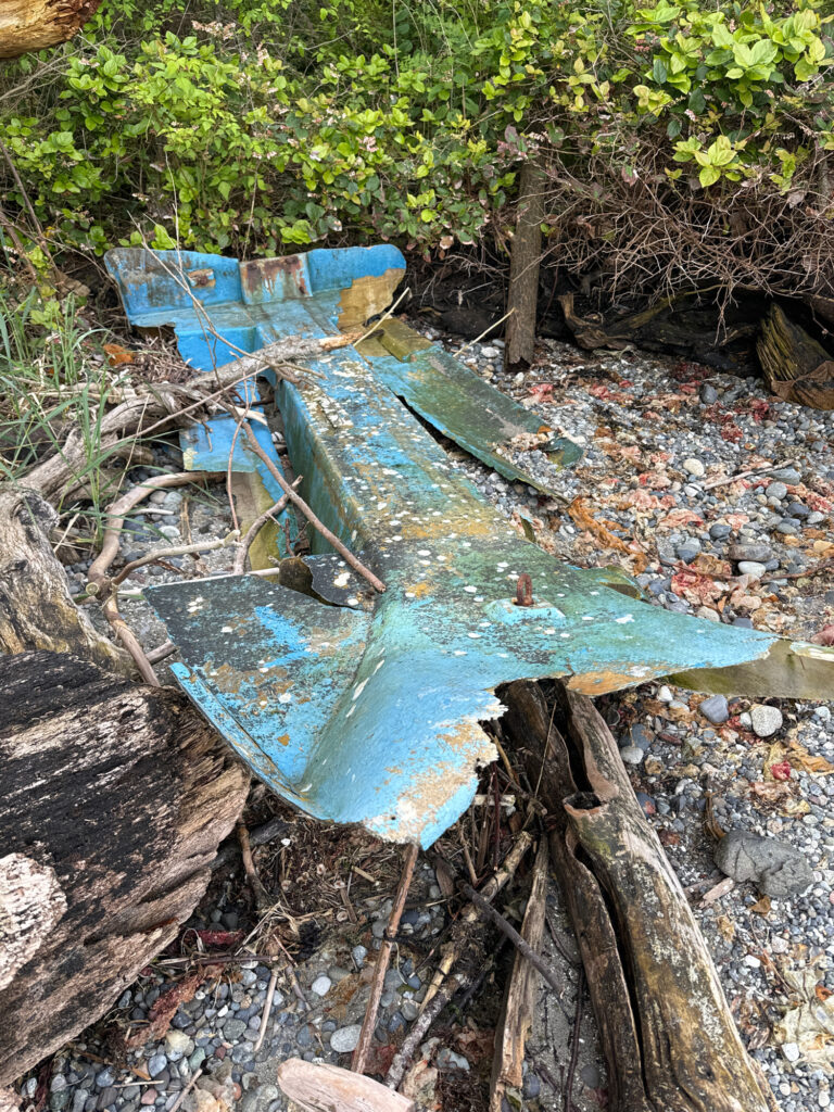 a blue chair on a rocky ground (MyCoast AI)