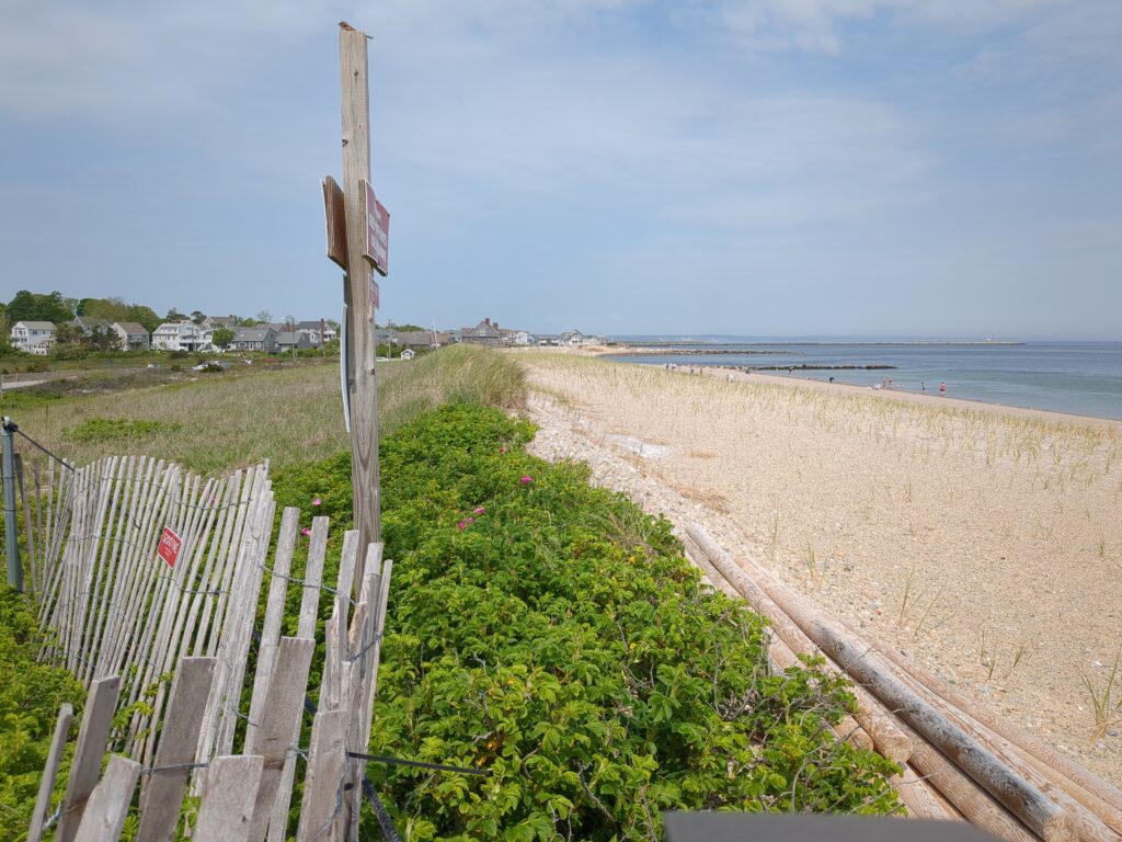 a wooden fence on a beach (MyCoast AI)