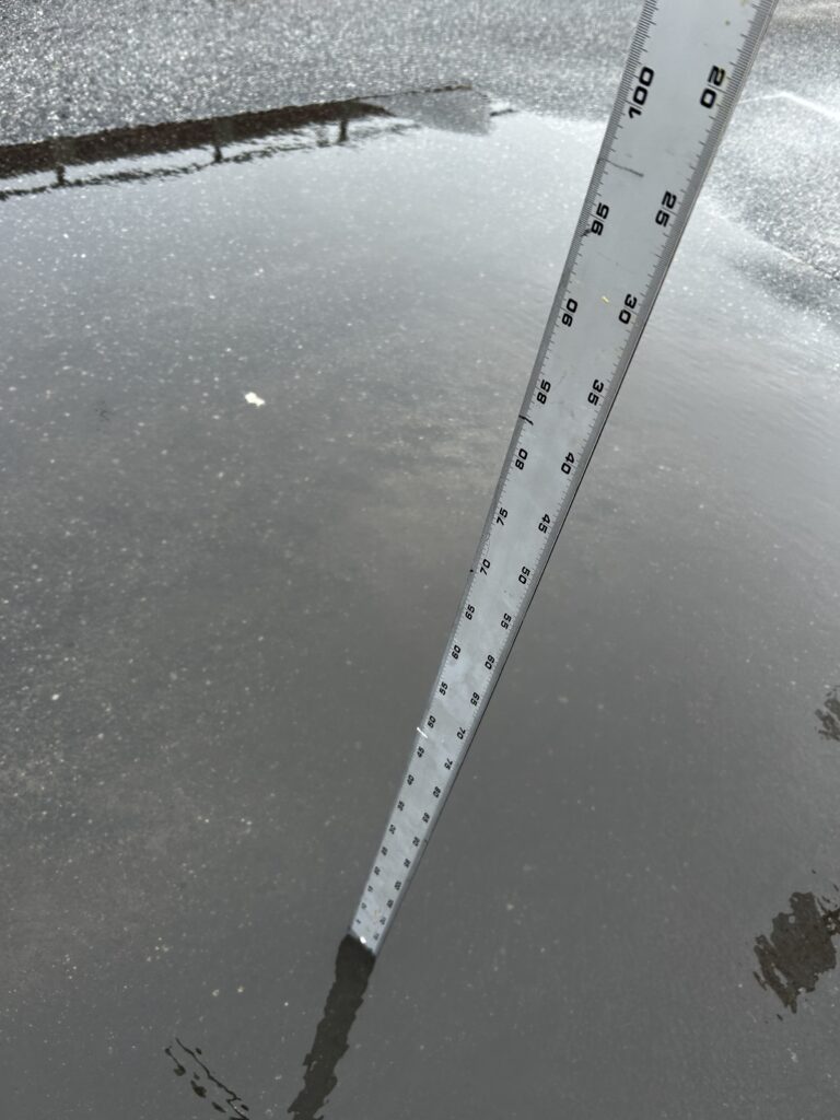 a long straight road with a white line on the side (MyCoast AI)