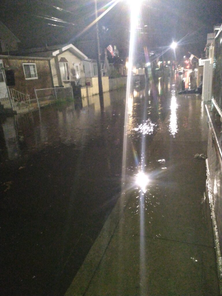 a wet street at night (MyCoast AI)
