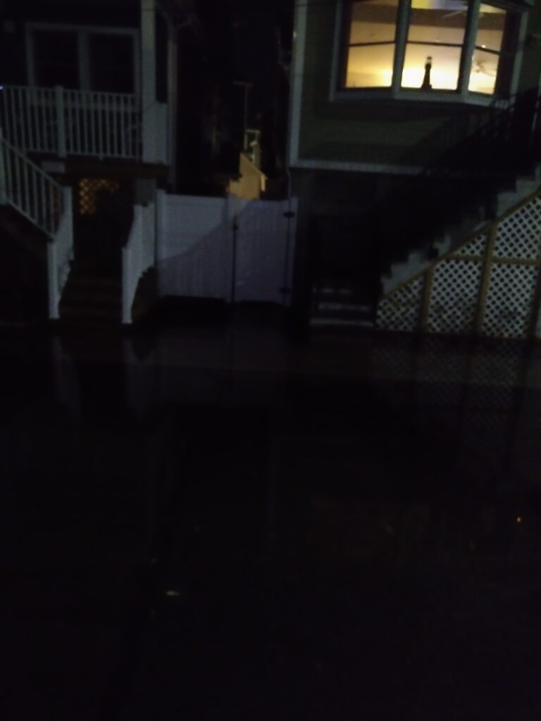 a dark staircase with a window (MyCoast AI)