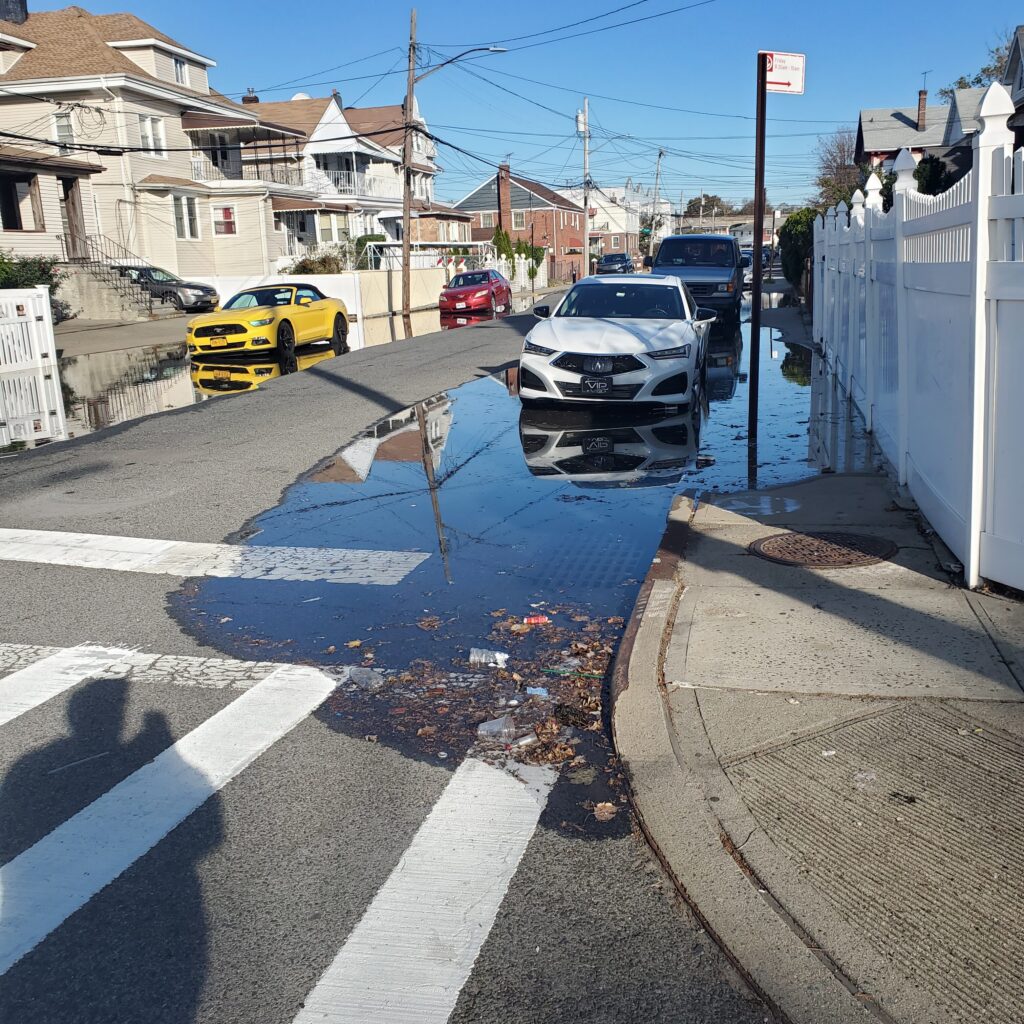 a street with cars parked on the side (MyCoast AI)
