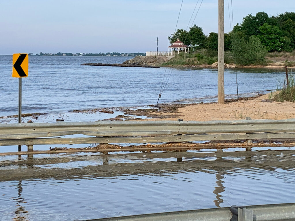 a beach with a sign (MyCoast AI)