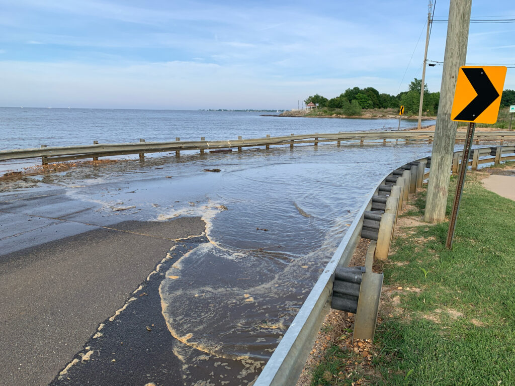 a road next to a body of water (MyCoast AI)