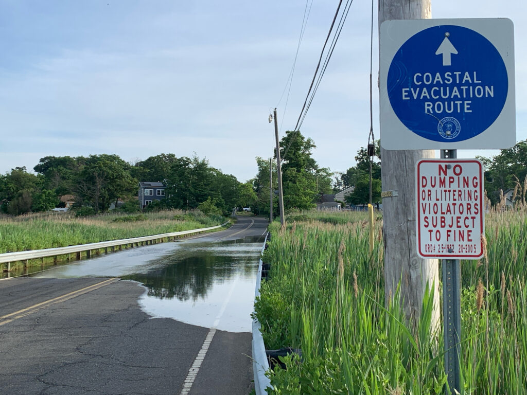 a sign on the side of a road (MyCoast AI)