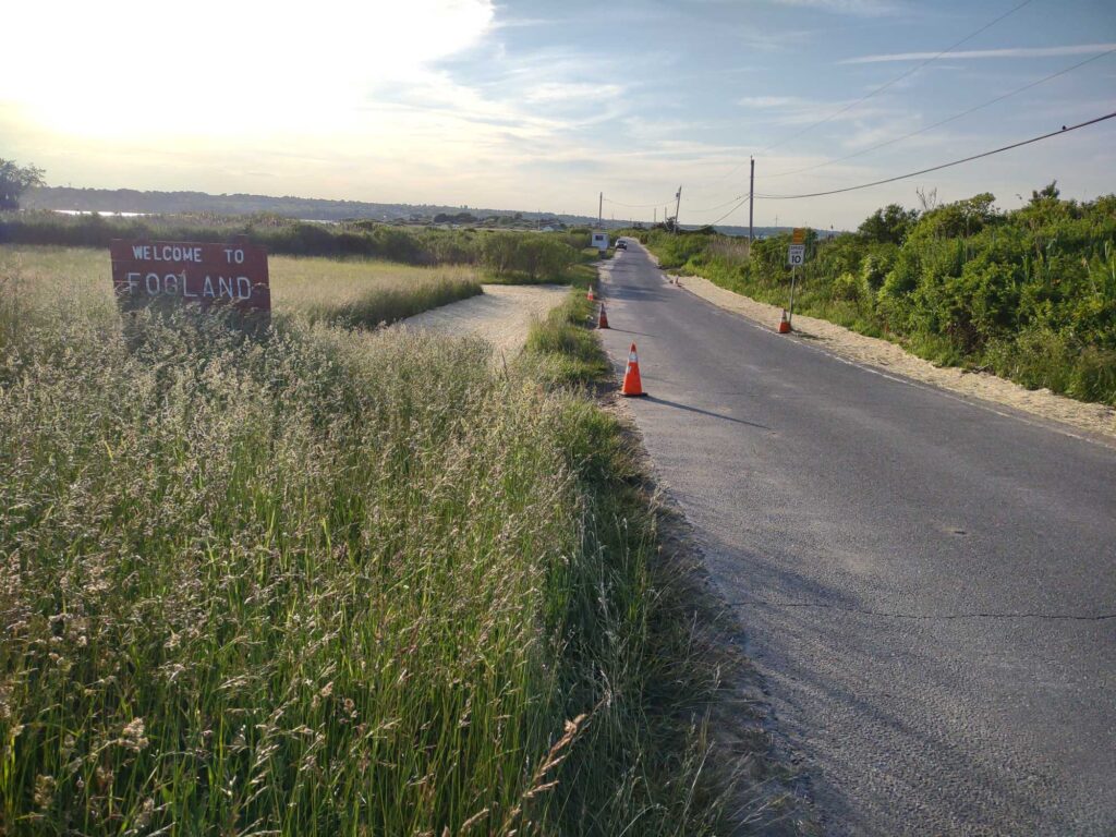 a road with a sign on it (MyCoast AI)