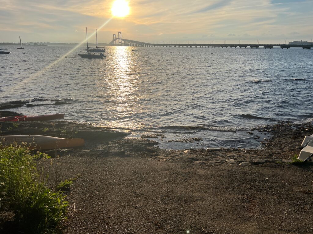 a beach with boats in the water (MyCoast AI)