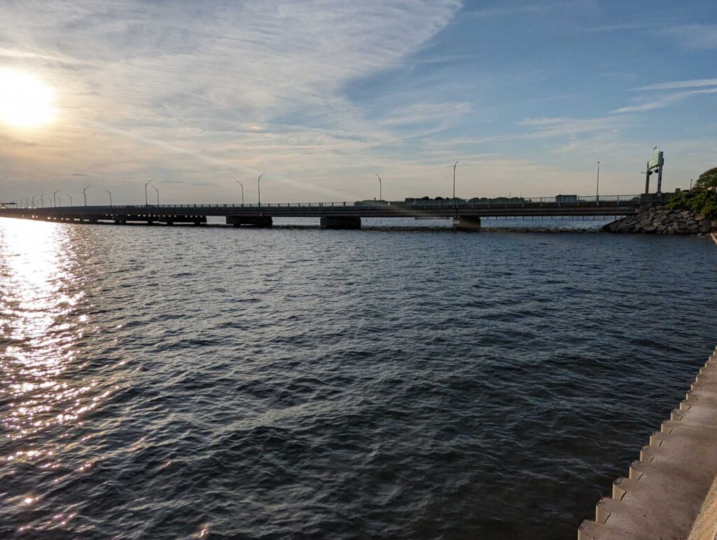 a body of water with a bridge over it (MyCoast AI)