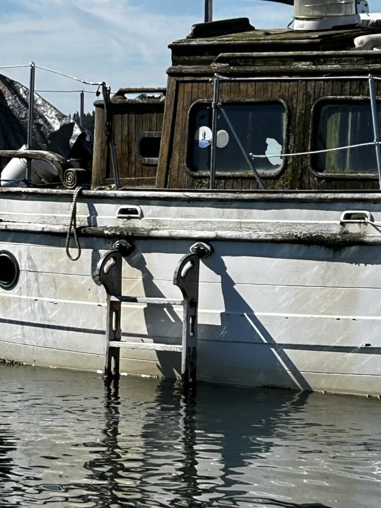 a boat is parked in the water (MyCoast AI)
