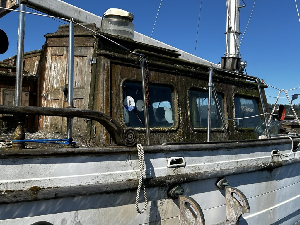 a boat is parked on the water (MyCoast AI)