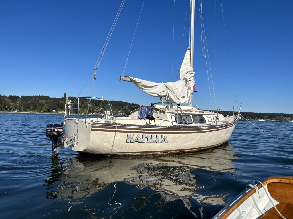 a boat is anchored in the water (MyCoast AI)
