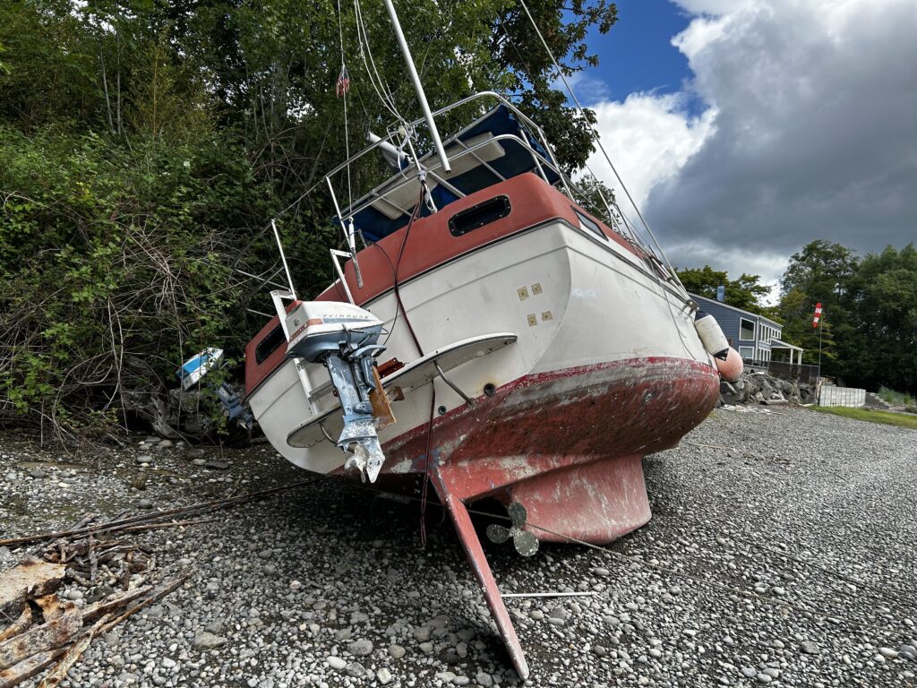 a boat on the ground (MyCoast AI)