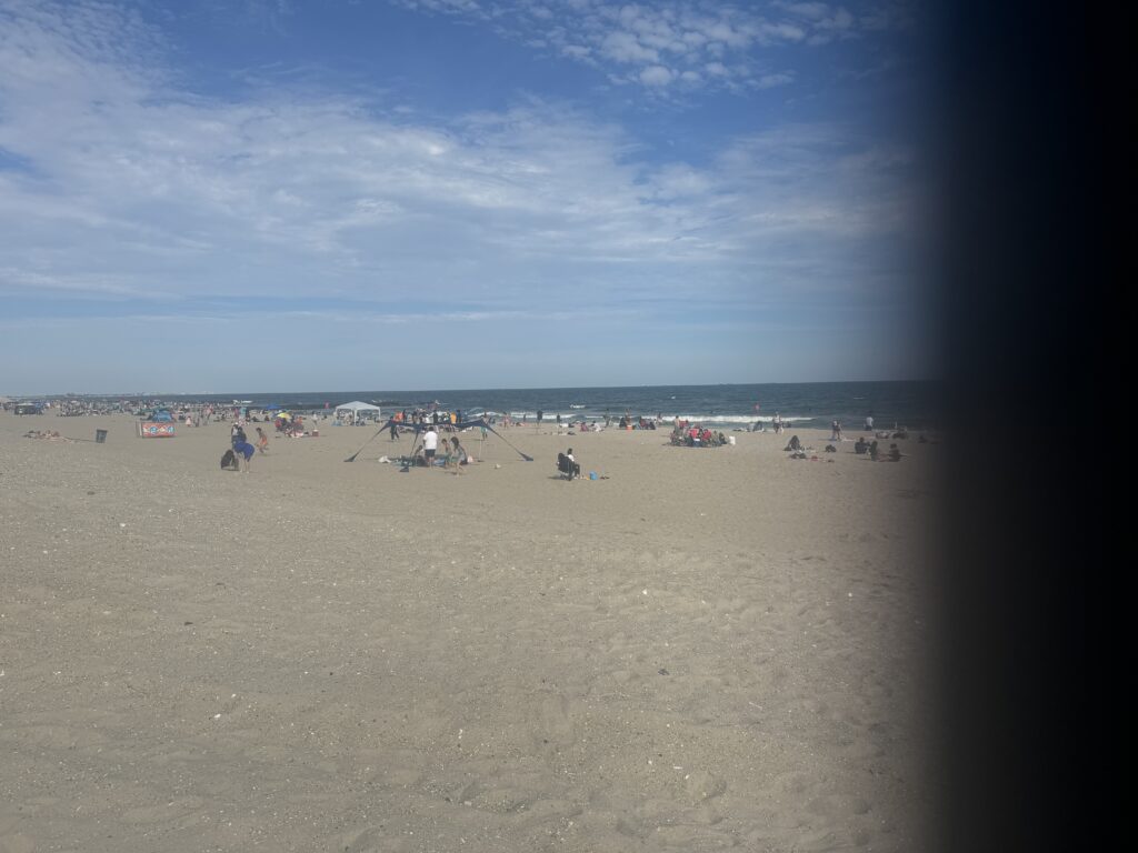 a beach with people on it (MyCoast AI)