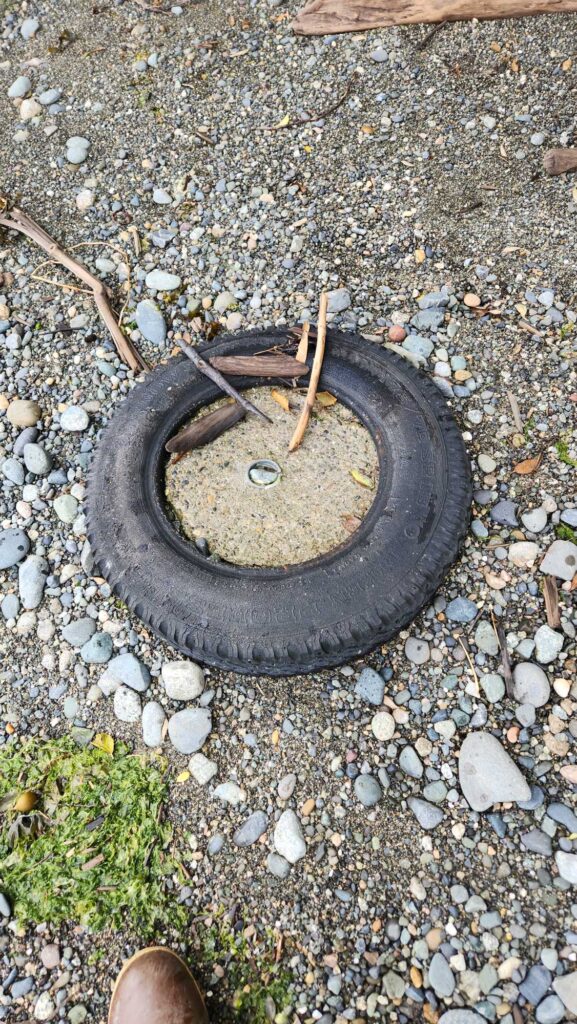 a tire on the ground (MyCoast AI)