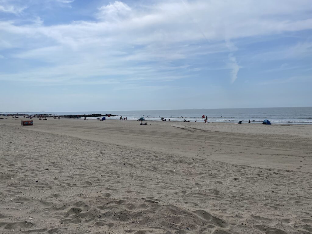 a beach with people on it (MyCoast AI)