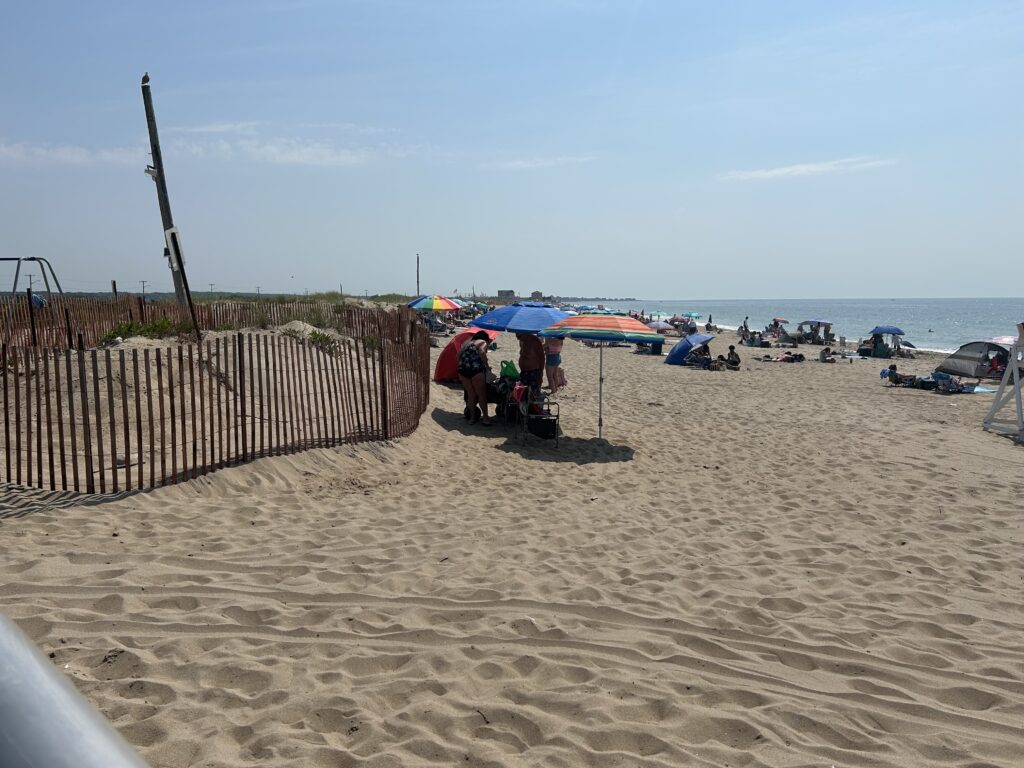a beach with umbrellas (MyCoast AI)