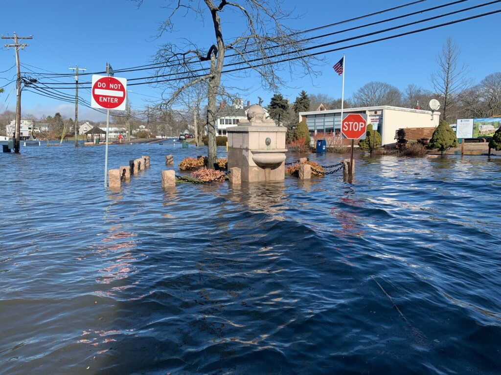 a flooded street with stop signs (MyCoast AI)