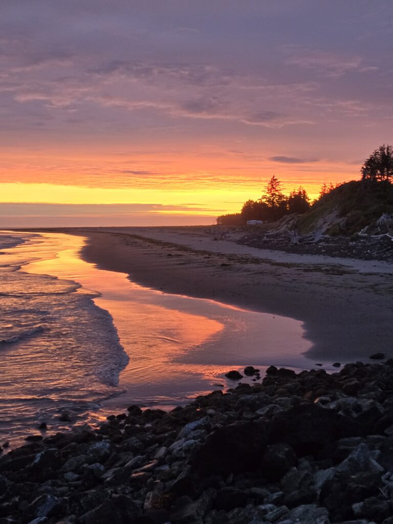 a beach with a sunset (MyCoast AI)