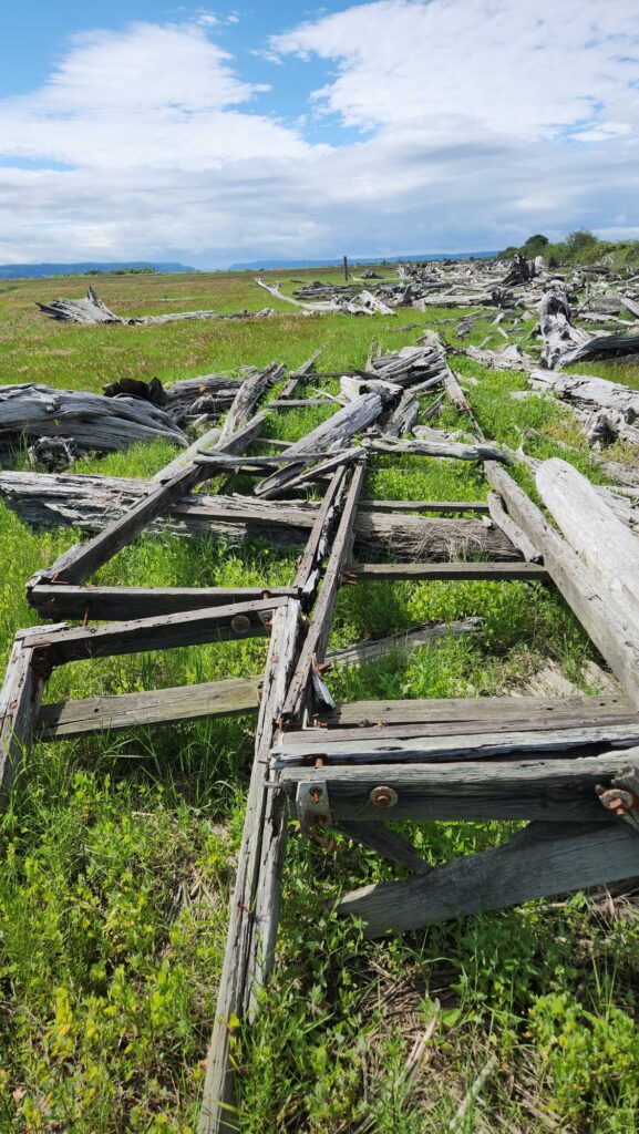 a wooden fence in a field (MyCoast AI)