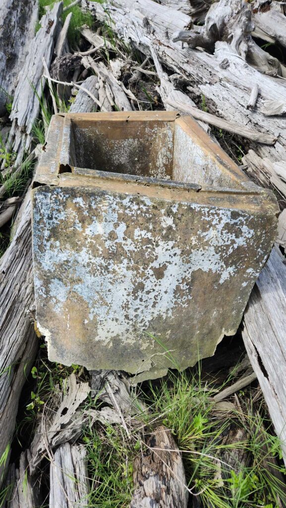 a wooden box with a hole in it (MyCoast AI)